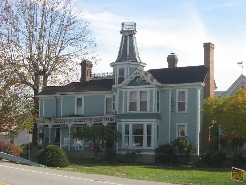 A Victorian house with a tower on Main Street in Rarden, Ohio